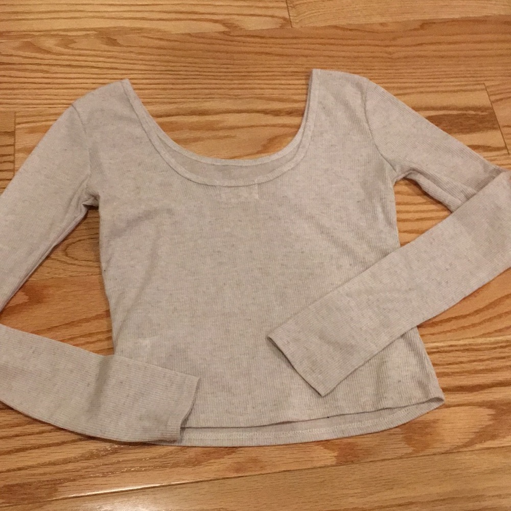 a beige long sleeve